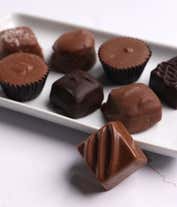 Alternative image 1 for A bottle of California Chardonnay by Hill and Harbor paired with a 1lb box of 28 assorted gourmet chocolates.  A refined combination for any occasion.
