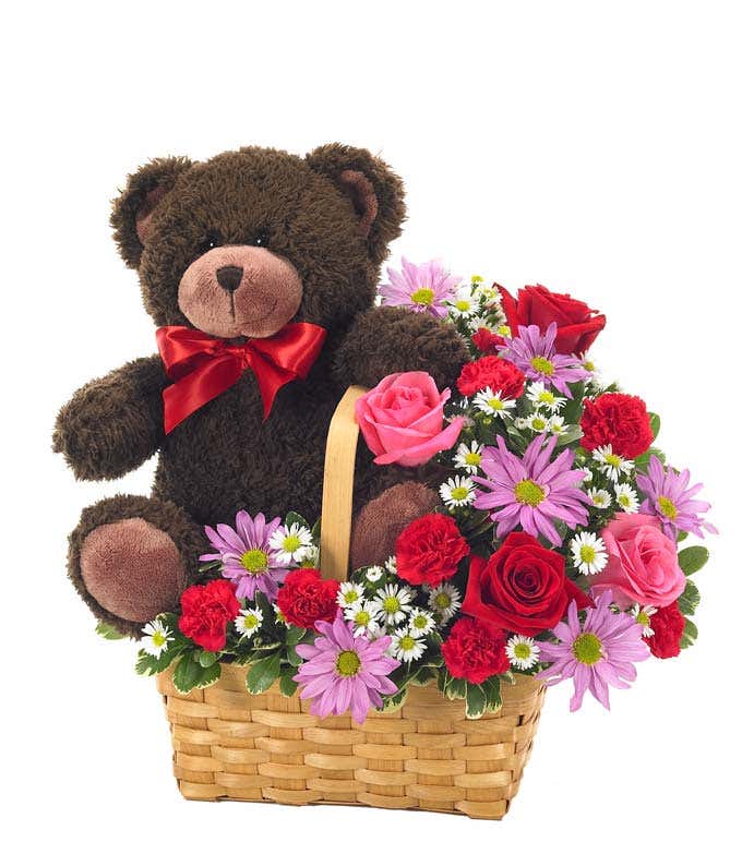 teddy bear delivered with roses in woven basket