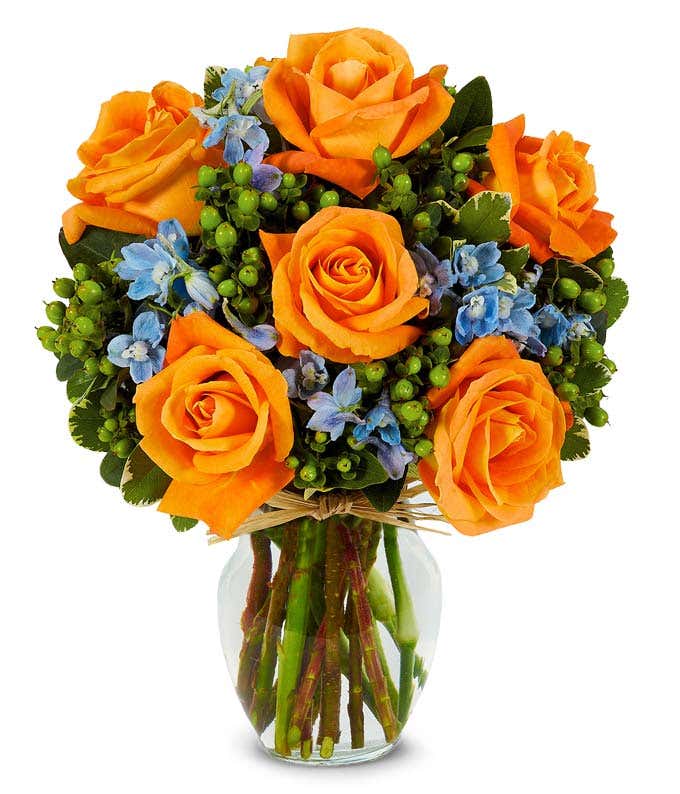 Orange roses and blue flowers