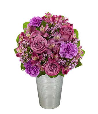 Lavender roses, purple alstroemeria and purple carnations 