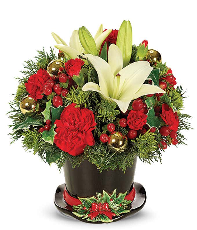 White and red Christmas flowers delivered in a holiday top hat