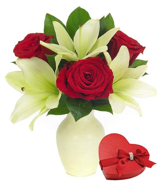 Red roses and white lilies delivered with Valentine's chocolates
