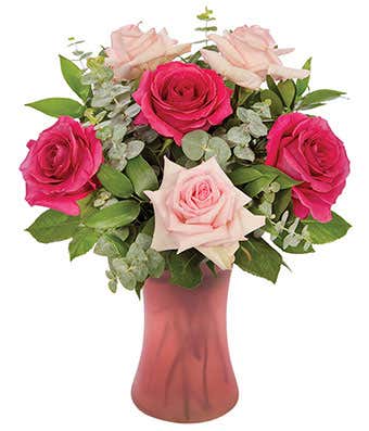 Roses and Eucalyptus bouquet in pink vase