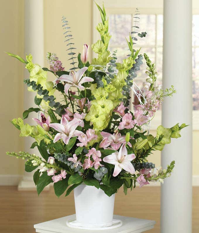 Green & Pink funeral flowers delivered by florist.