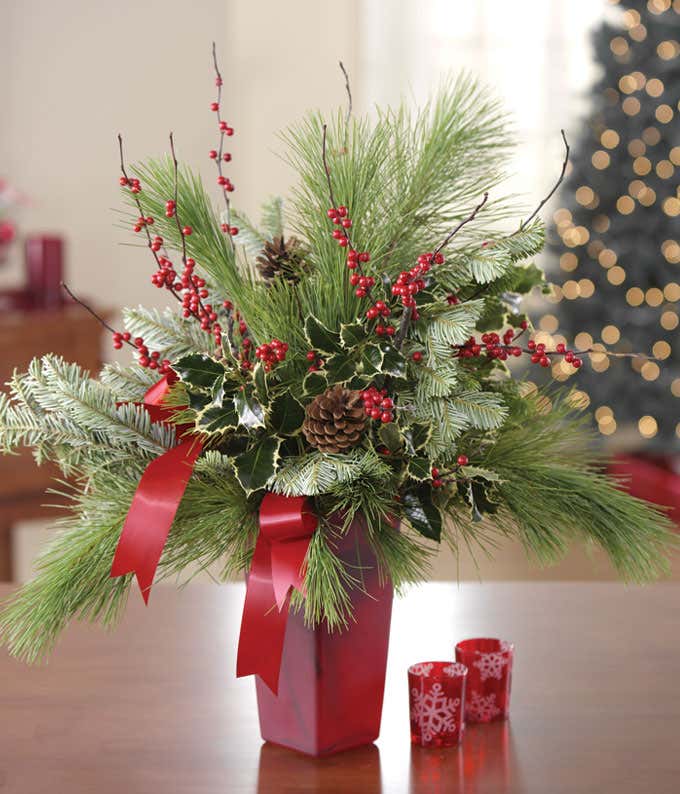 Christmas arrangement with hypericum berries and evergreen