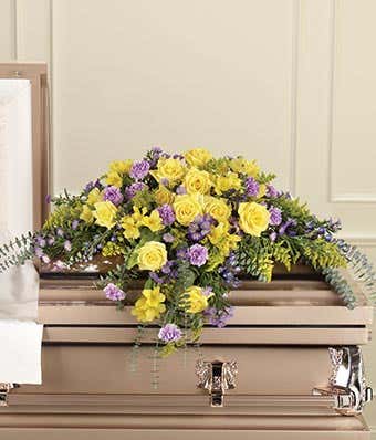 Yellow rose and purple carnation casket spray