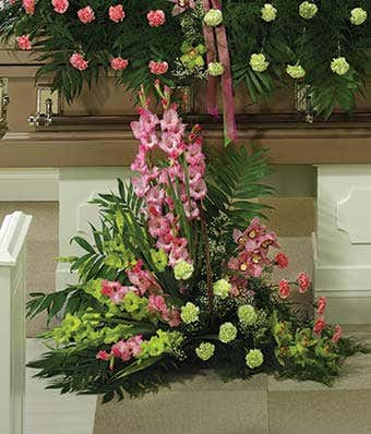 Funeral flower basket with pink and green gladiolus