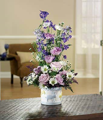 Lavender roses, blue delphinium and monte casino delivered