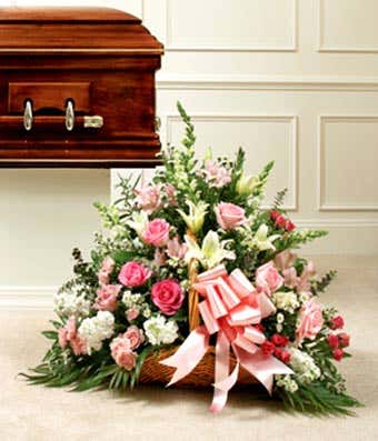 Pink roses, white roses and carnation fireside basket