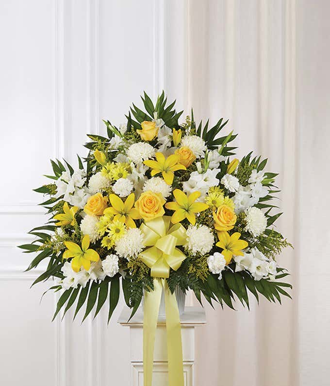 Yellow & white rose and lily sympathy standing basket