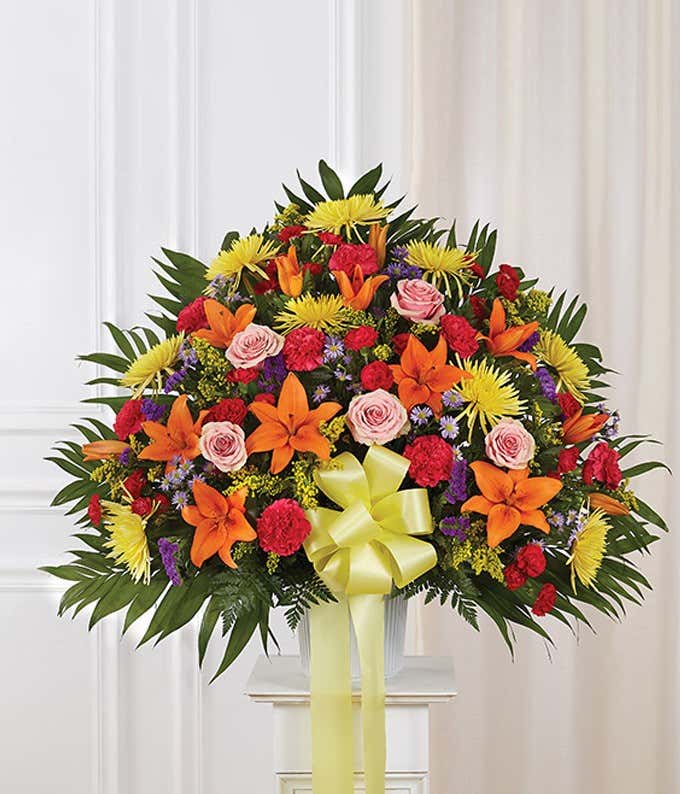 Multicolor flower sympathy standing basket