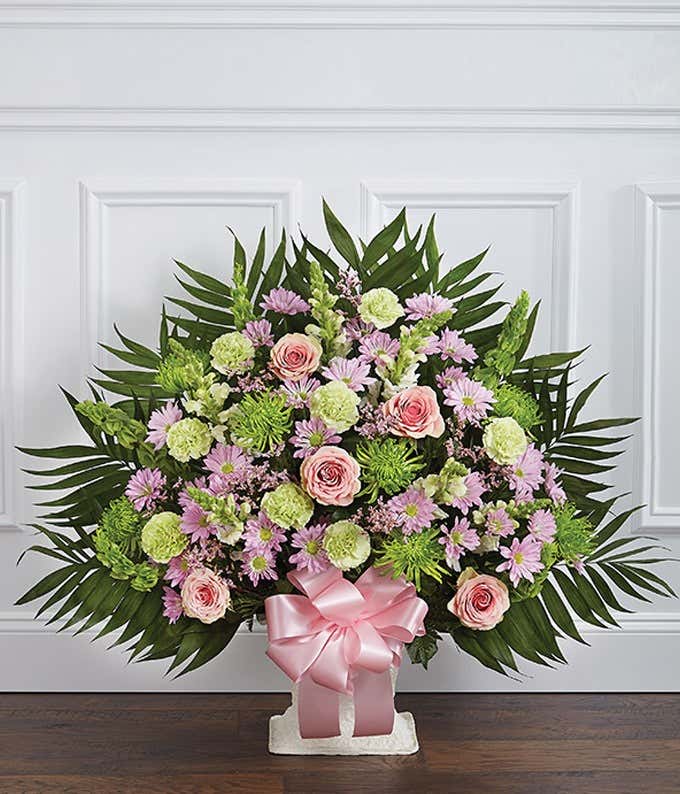 Pink and green snapdragons and gladioloas sympathy basket
