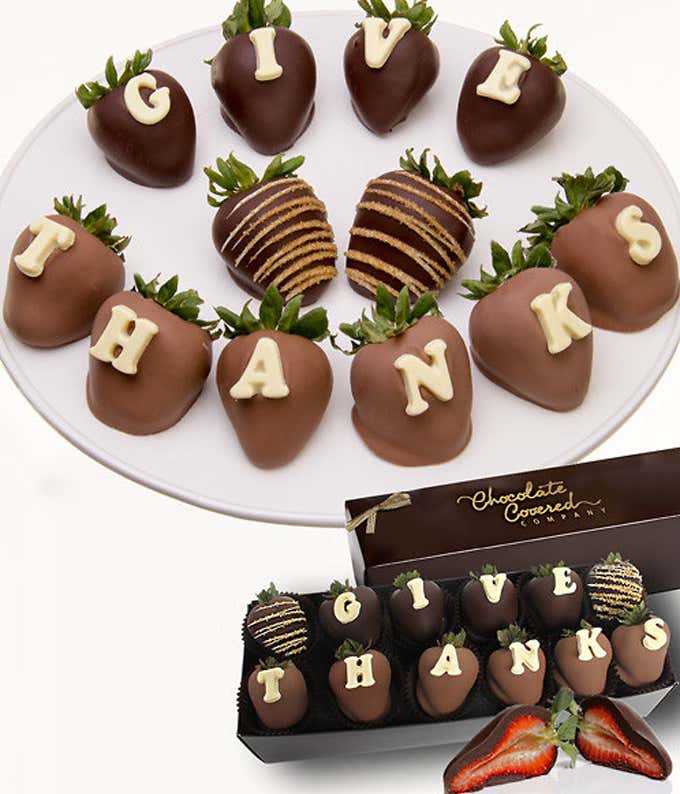  A delightful assortment featuring one dozen large strawberries, decorated with a 'Give Thanks' message, and coated in milk and dark chocolate.