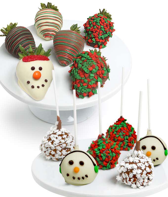 Six cake pops dipped in white and milk chocolate with red and green drizzles, snowflake sprinkles, and snowmen designs and six chocolate covered strawberries dipped in white and milk chocolate with red and green drizzles and snowflake designs