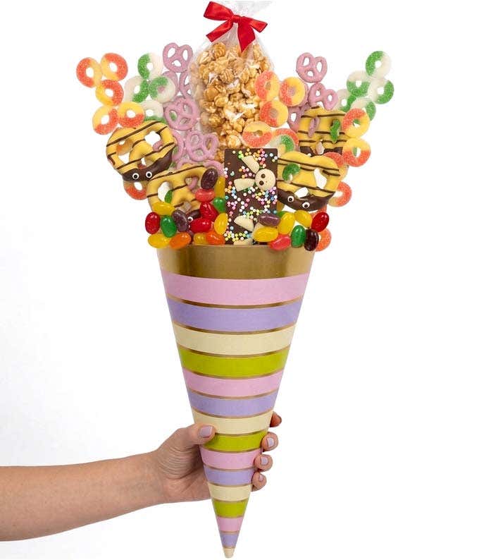 Cone Height 22in.. Candies and chocolates are packaged inside the cone for freshness.  The bouquet-style display is for visual presentation only.