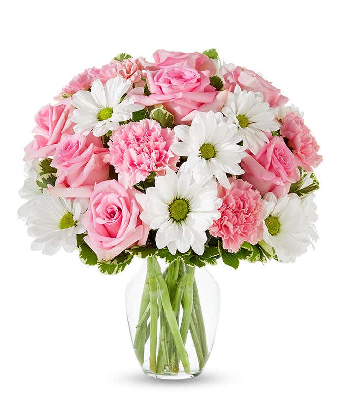 Premium bouquet of exquisite pink roses, elegant white daisies, and lush pink carnations with optional high-quality glass vase and personalized gift message for a new baby.