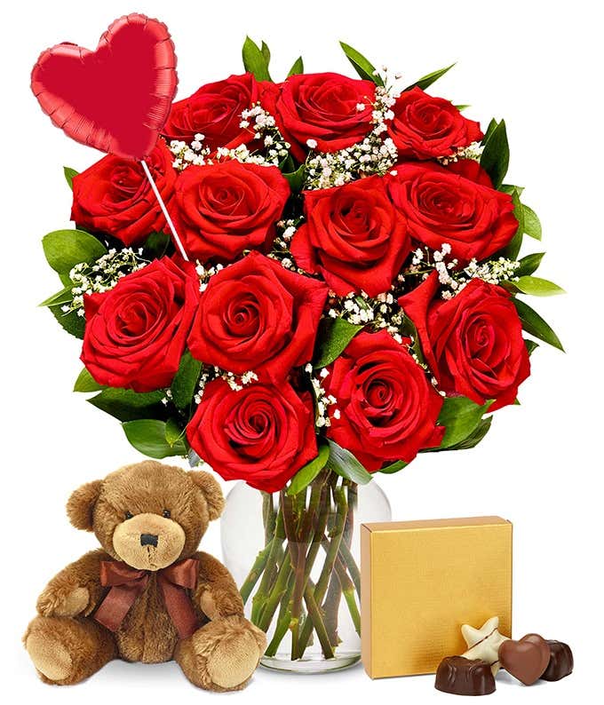 One dozen red roses delivered with heart balloon, teddy bear and chocolates