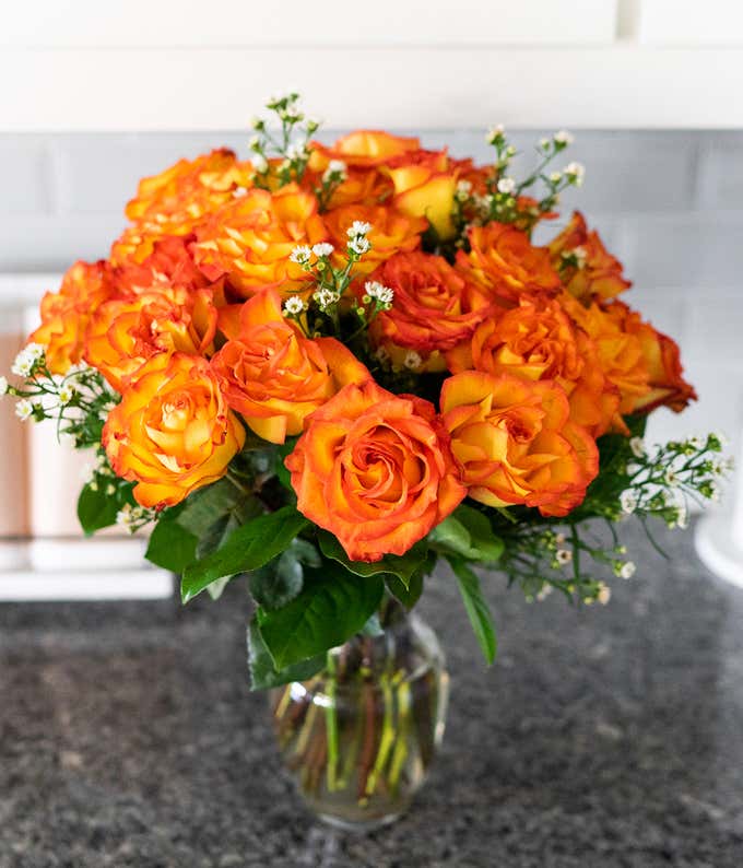 Two Dozen Orange Roses with Clear Glass Vase