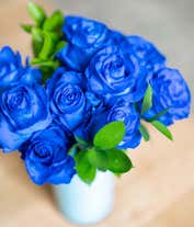 Alternative image 1 for A bouquet of one dozen blue roses, optionally arranged in a glass vase.