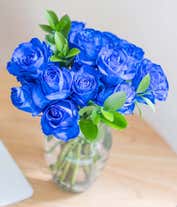 Alternative image 2 for A bouquet of one dozen blue roses, optionally arranged in a glass vase.