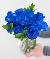 Alternative image 3 for A bouquet of one dozen blue roses, optionally arranged in a glass vase.