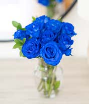 Alternative image 4 for A bouquet of one dozen blue roses, optionally arranged in a glass vase.
