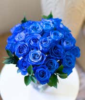 Alternative image 2 for A bouquet of two dozen blue roses, with an optional glass vase.