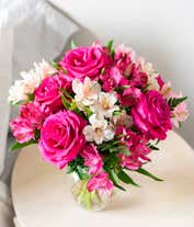 Alternative image 1 for A bouquet featuring pink roses and pink alstroemeria, with an optional glass vase.