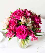 Alternative image 3 for A bouquet featuring pink roses and pink alstroemeria, with an optional glass vase.