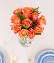 Alternative image 1 for One Dozen Orange Roses in a Clear Glass Vase
