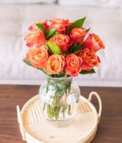 Alternative image 2 for One Dozen Orange Roses in a Clear Glass Vase