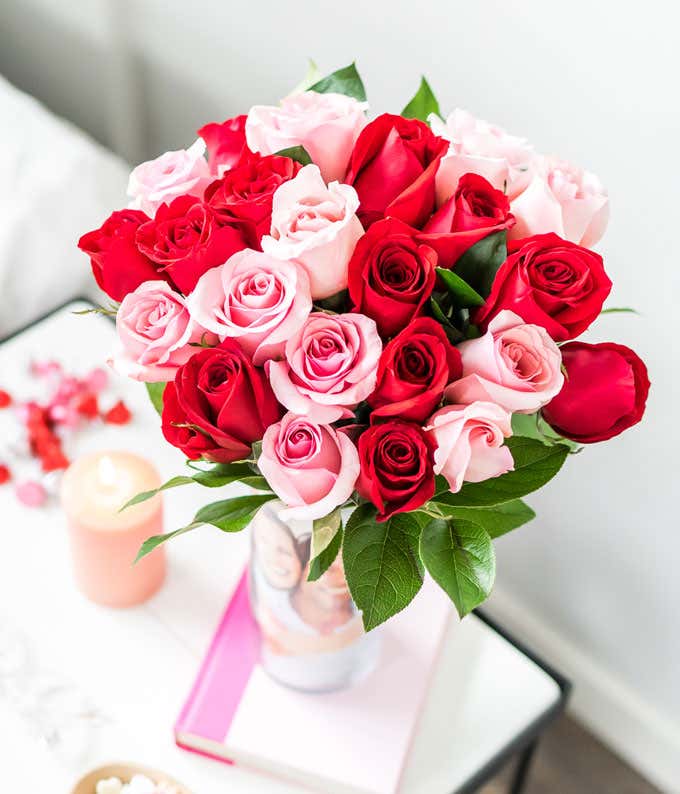 Two Dozen Red & Pink Long Stem Roses with a Clear Glass Vase