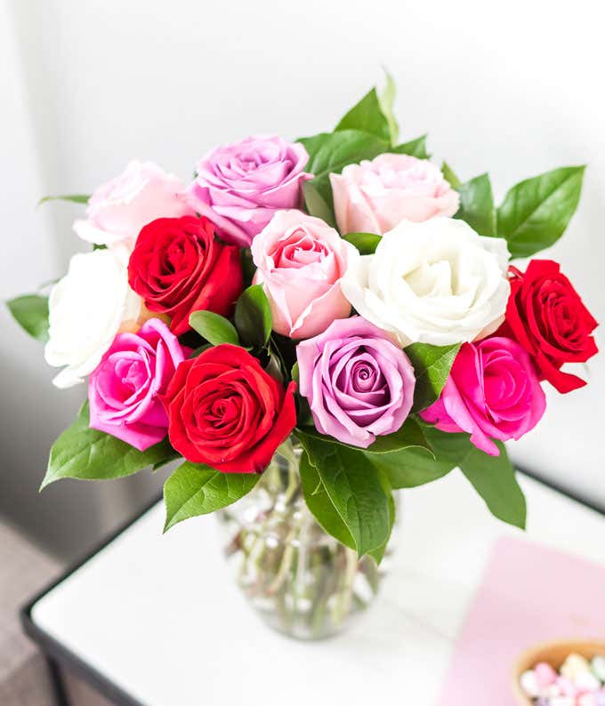 One Dozen Red, Pink, Purple & White Roses with a Clear Glass Vase