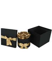 Alternative image 2 for One dozen gold preserved roses arranged in a black hat box with a gold ribbon.