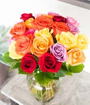 Alternative image 2 for Two dozen rainbow roses with one dozen chocolate covered strawberries.