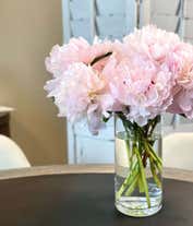 Alternative image 3 for A stunning arrangement of 10 assorted pink peonies, optionally presented in a glass vase. These lush and fragrant peonies create a beautiful and elegant display, perfect for adding a touch of romance to any setting.