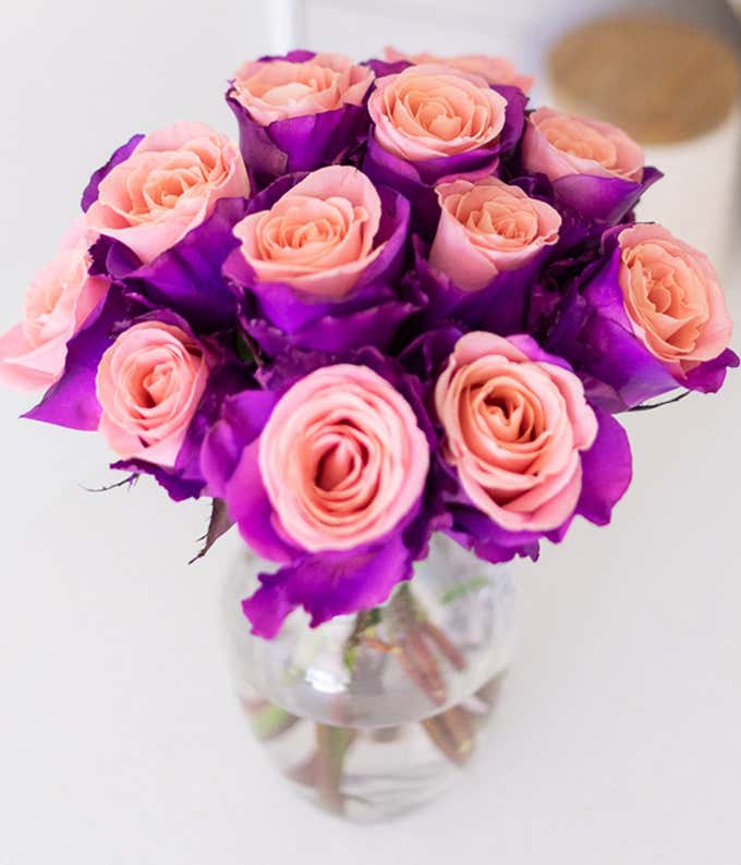 One Dozen Lavender Roses in Clear Glass Vase