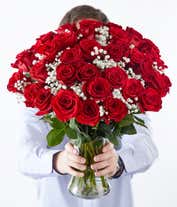 Alternative image 4 for Three dozen red roses with babies breath in a clear glass gathering vase