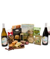 An abundant gift box filled with two bottles of California wine - red & white, assorted crackers, three cheeses, summer sausage, and snacks to make an amazing charcuterie spread. 