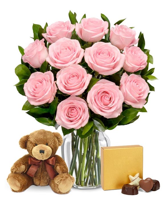 One Dozen Pink Roses with Chocolates and a Bear at From You Flowers