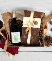 Alternative image 1 for a bottle of California Pinot Noir paired with a 1lb box of 28 assorted gourmet chocolates