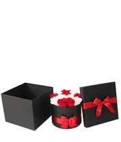 Alternative image 2 for Elegant arrangement of red and white roses in a black round box, adorned with a red satin ribbon and bow, creating a sophisticated and romantic floral gift.