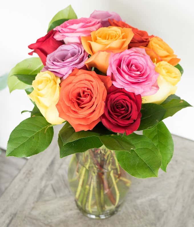 One Dozen Rainbow Roses with Vase