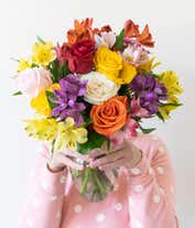 Alternative image 3 for A beautiful arrangement featuring mixed roses and assorted alstroemeria, optionally presented in a glass vase. This vibrant mix offers a colorful and cheerful display, perfect for any occasion.