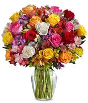 A bouquet featuring mixed roses and alstroemerias, with an optional vase.