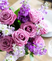 Alternative image 2 for Purple roses and stock in glass vase
