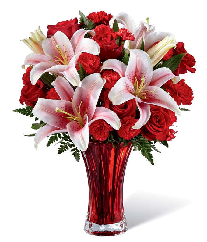 Love flowers with red roses, red carnations and pink lilies