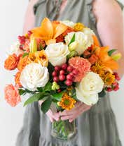 Alternative image 2 for Orange lilies, cream roses and orange roses are arranged for Fall delivery