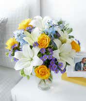 Alternative image 3 for Yellow roses, blue delphinium and white lilies in a vase for Mothers Day