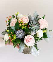 Alternative image 1 for A charming floral arrangement featuring pink roses, white lisianthus, peach berries, a succulent cutting, all beautifully arranged in a glass vase, with an option for personalization. This vibrant mix creates a stunning and unique display.